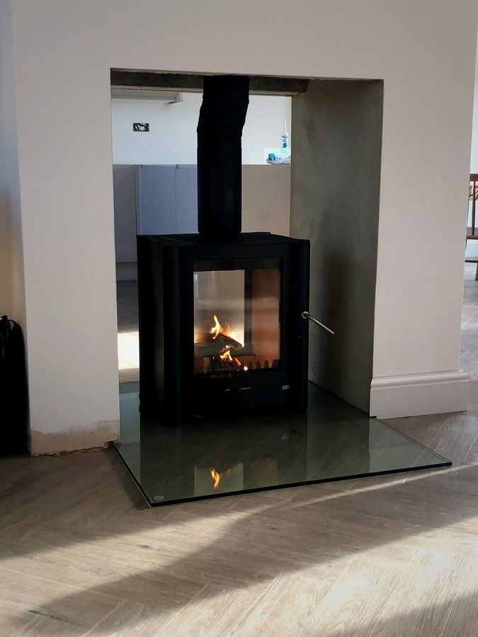 Double-sided stove installed by EmberCraft in Kent