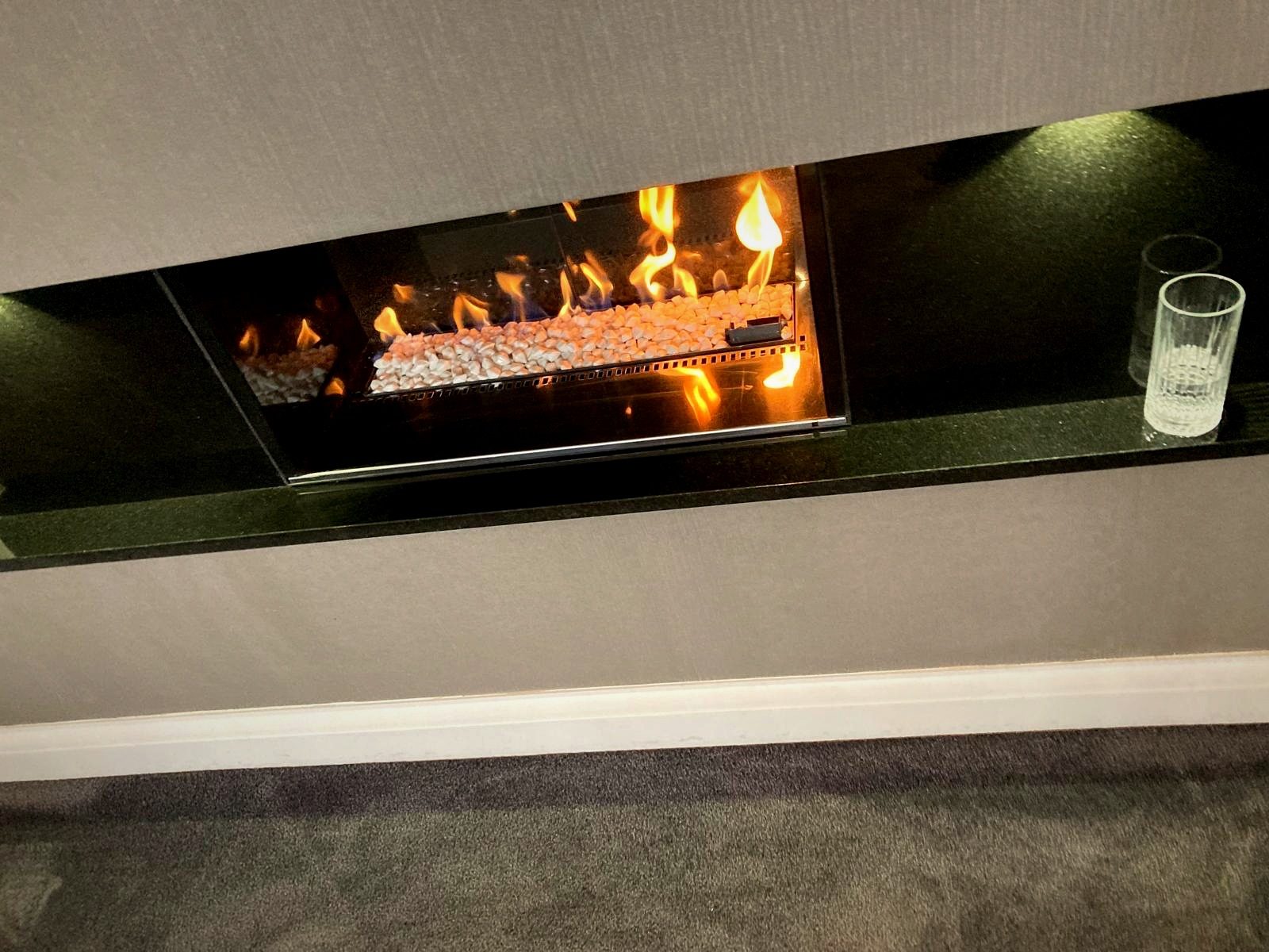 A premium linear gas fire of the kind EmberCraft services and repairs