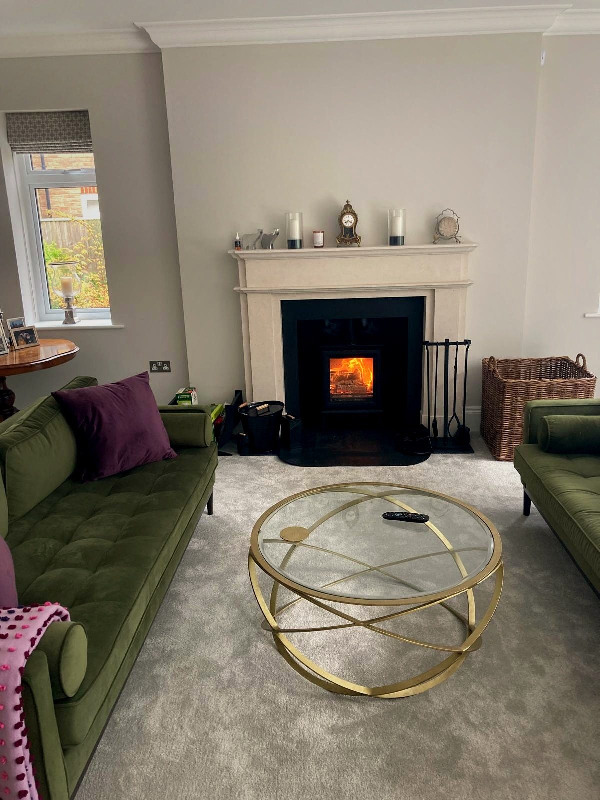 A fireplace in a bright open-plan living room, installed by EmberCraft