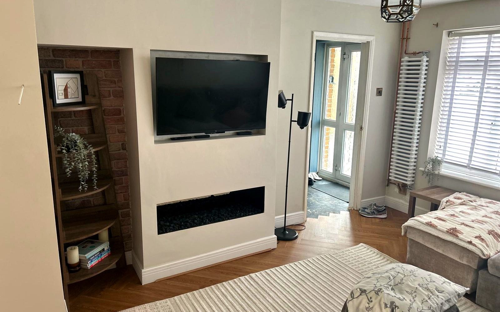 A twin-alcove media wall installed by EmberCraft, serving Walmer, Kent
